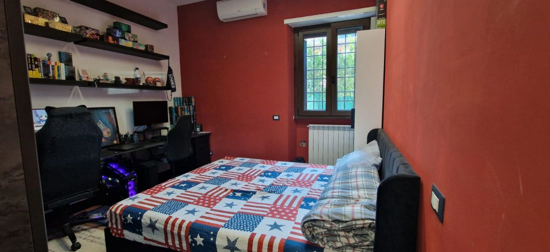 QUADRILOCALE RISTRUTTURATO CON GIARDINO E POSTO AUTO