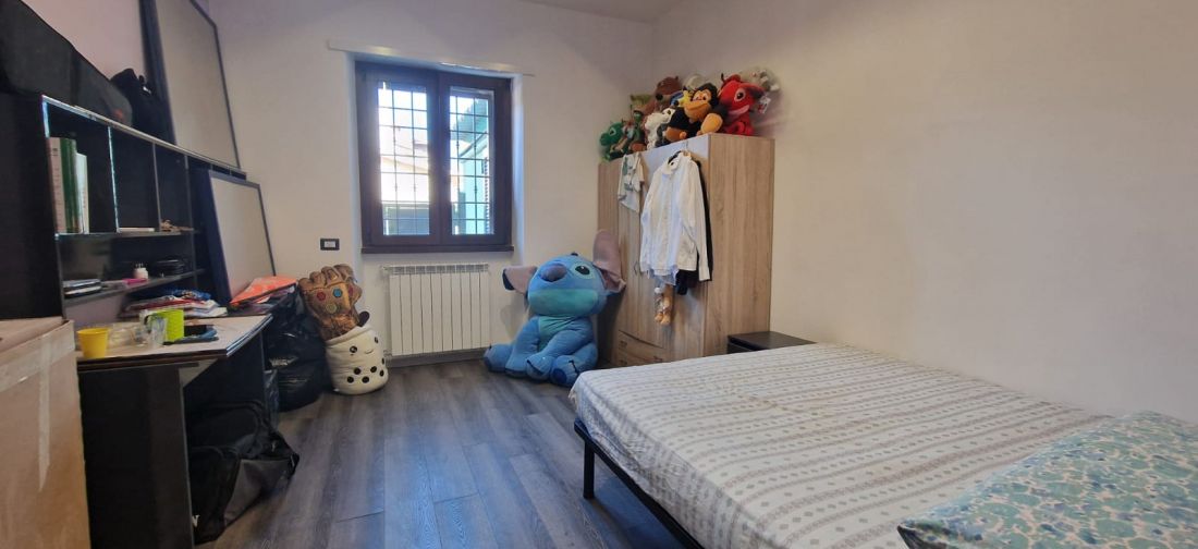 QUADRILOCALE RISTRUTTURATO CON GIARDINO E POSTO AUTO