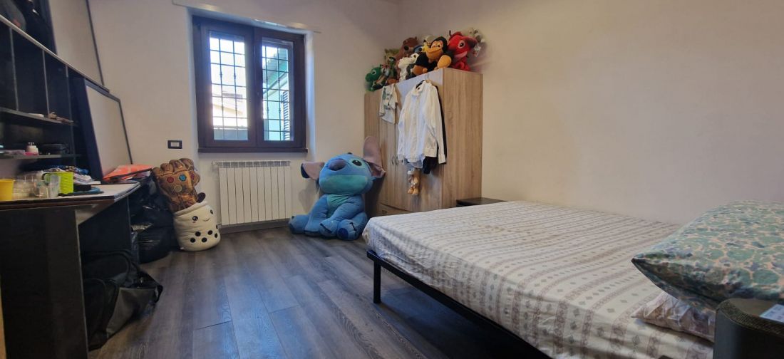 QUADRILOCALE RISTRUTTURATO CON GIARDINO E POSTO AUTO