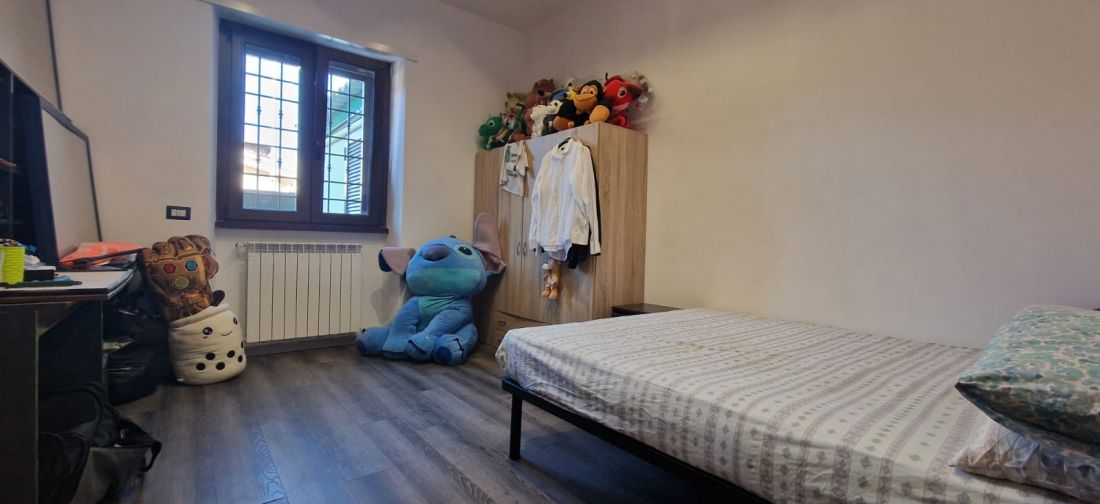 QUADRILOCALE RISTRUTTURATO CON GIARDINO E POSTO AUTO
